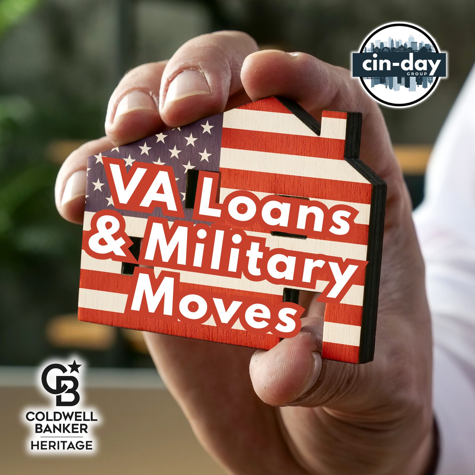 A person’s hand holds a small wooden house painted with the American flag, symbolizing homeownership and patriotism. Text on the house reads “VA Loans & Military Moves,” with the Cin-Day Group and Coldwell Banker Heritage logos visible.